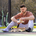 personne vissant parallette Peisma parc callisthénie street workout